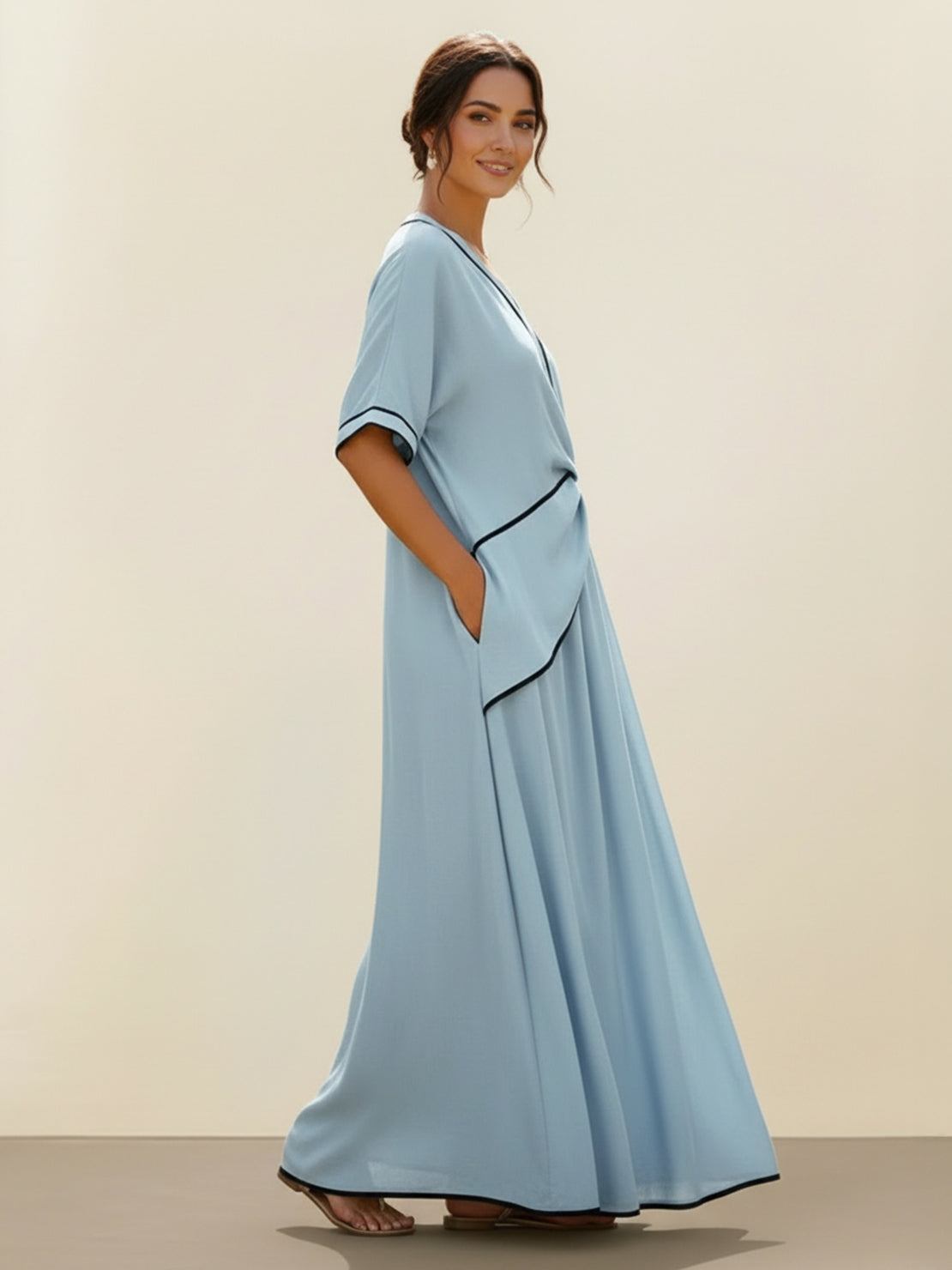 Vestido maxi de cintura anudada y caída fluida