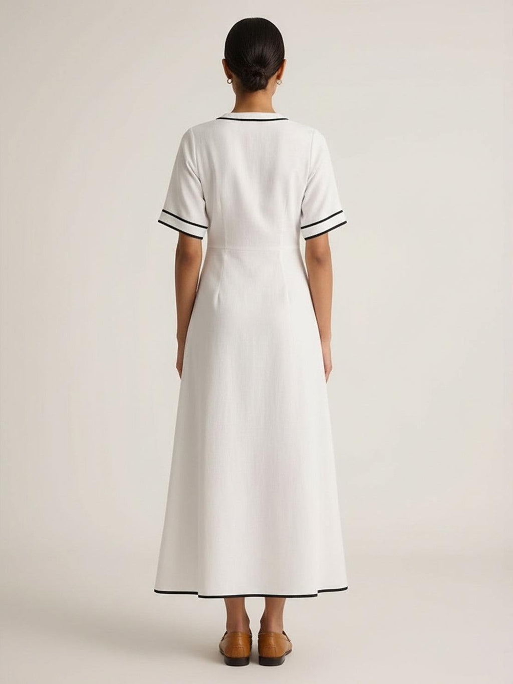 Vestido maxi de cintura anudada y caída fluida
