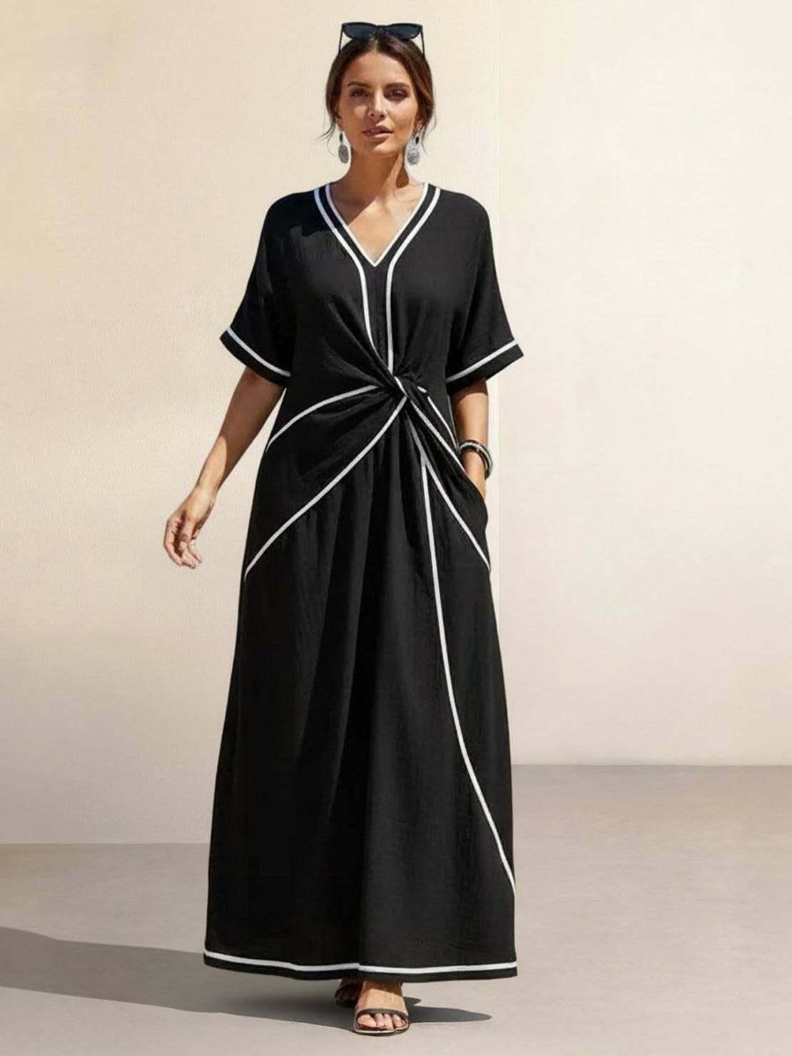 Vestido maxi de cintura anudada y caída fluida