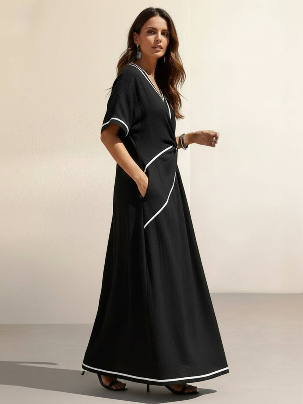 Vestido maxi de cintura anudada y caída fluida