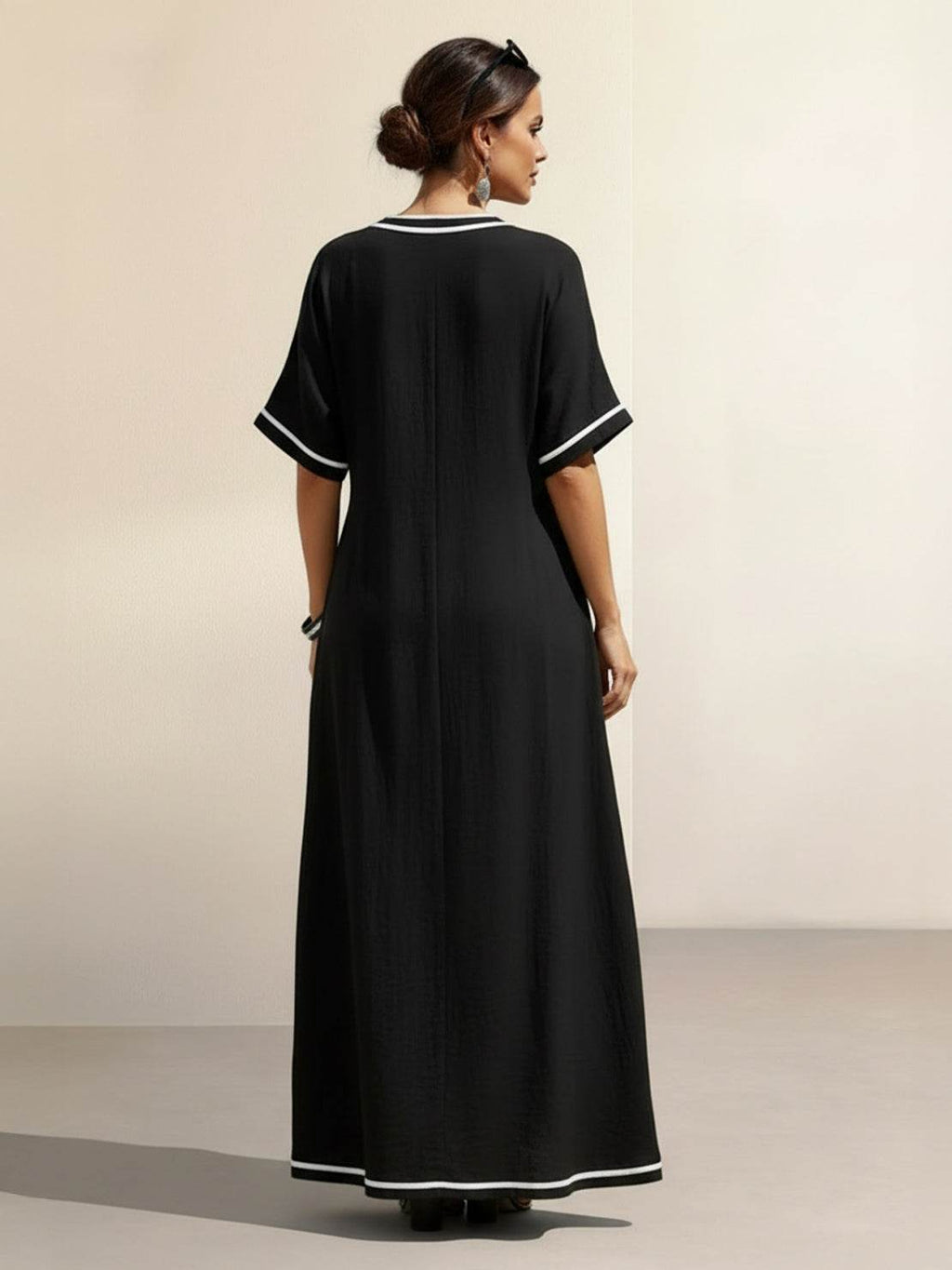 Vestido maxi de cintura anudada y caída fluida