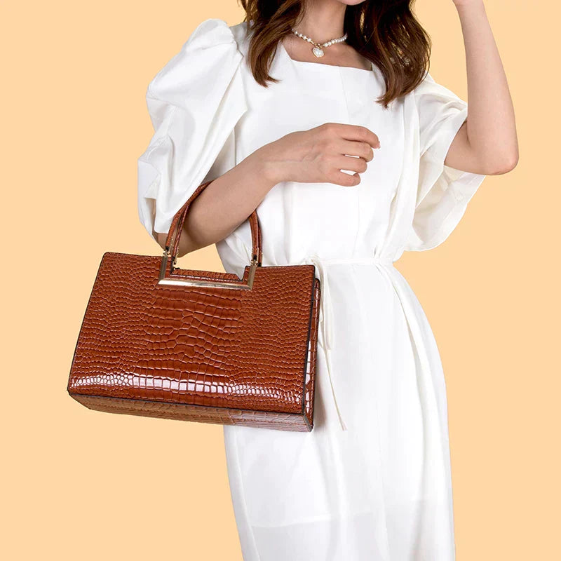 Conjunto de bolso y cartera de piel