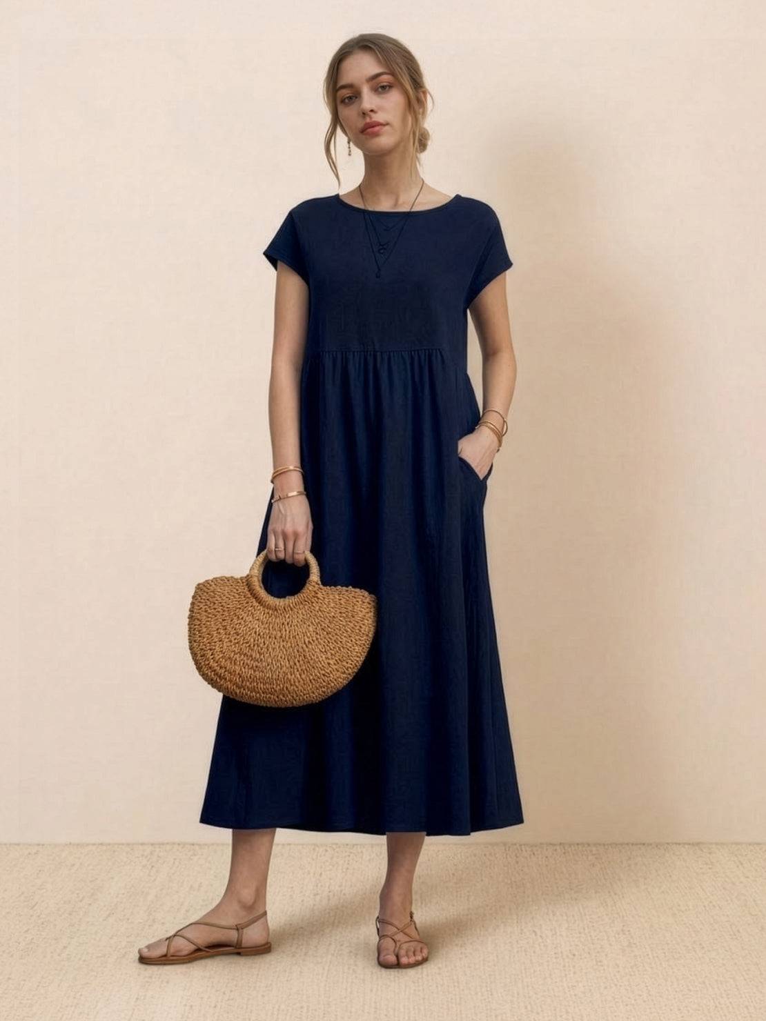 Vestido midi plisado con mangas tipo cap y volumen