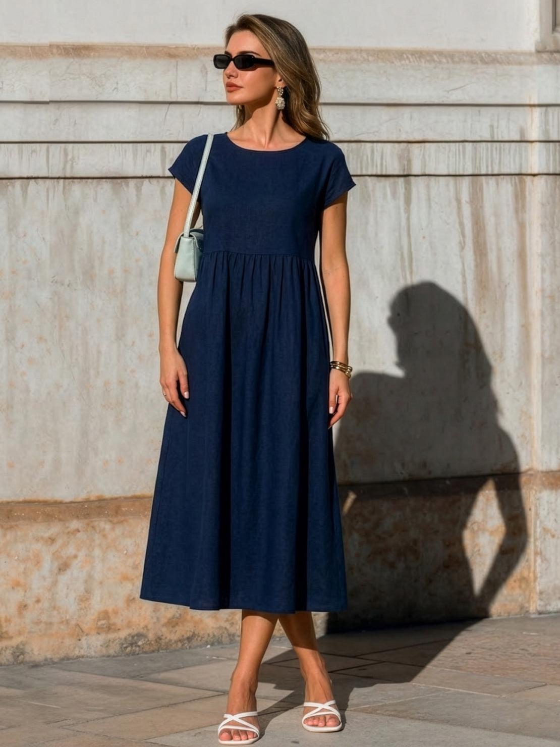 Vestido midi plisado con mangas tipo cap y volumen