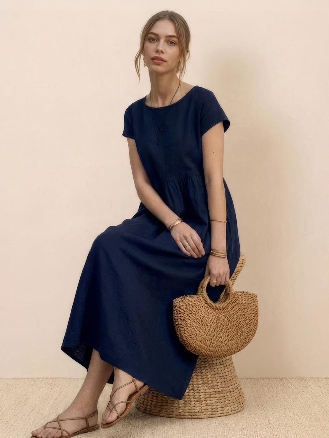 Vestido midi plisado con mangas tipo cap y volumen