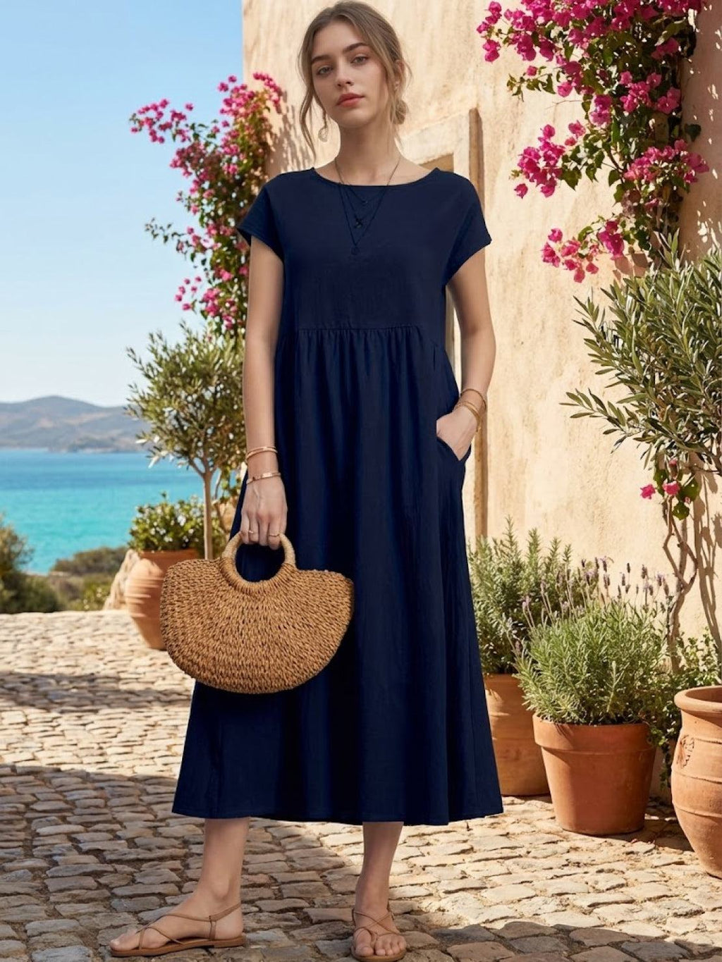 Vestido midi plisado con mangas tipo cap y volumen