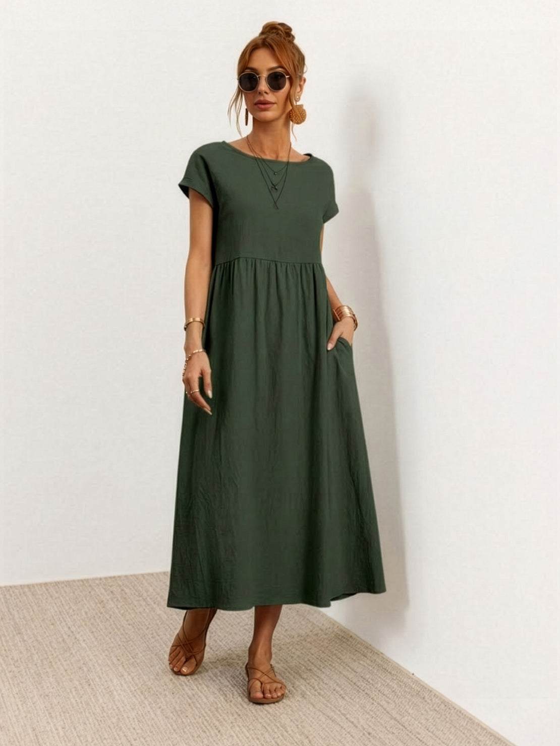 Vestido midi plisado con mangas tipo cap y volumen