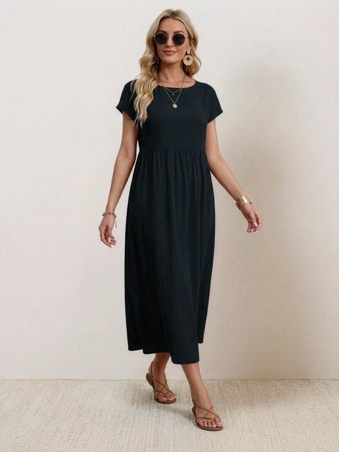 Vestido midi plisado con mangas tipo cap y volumen