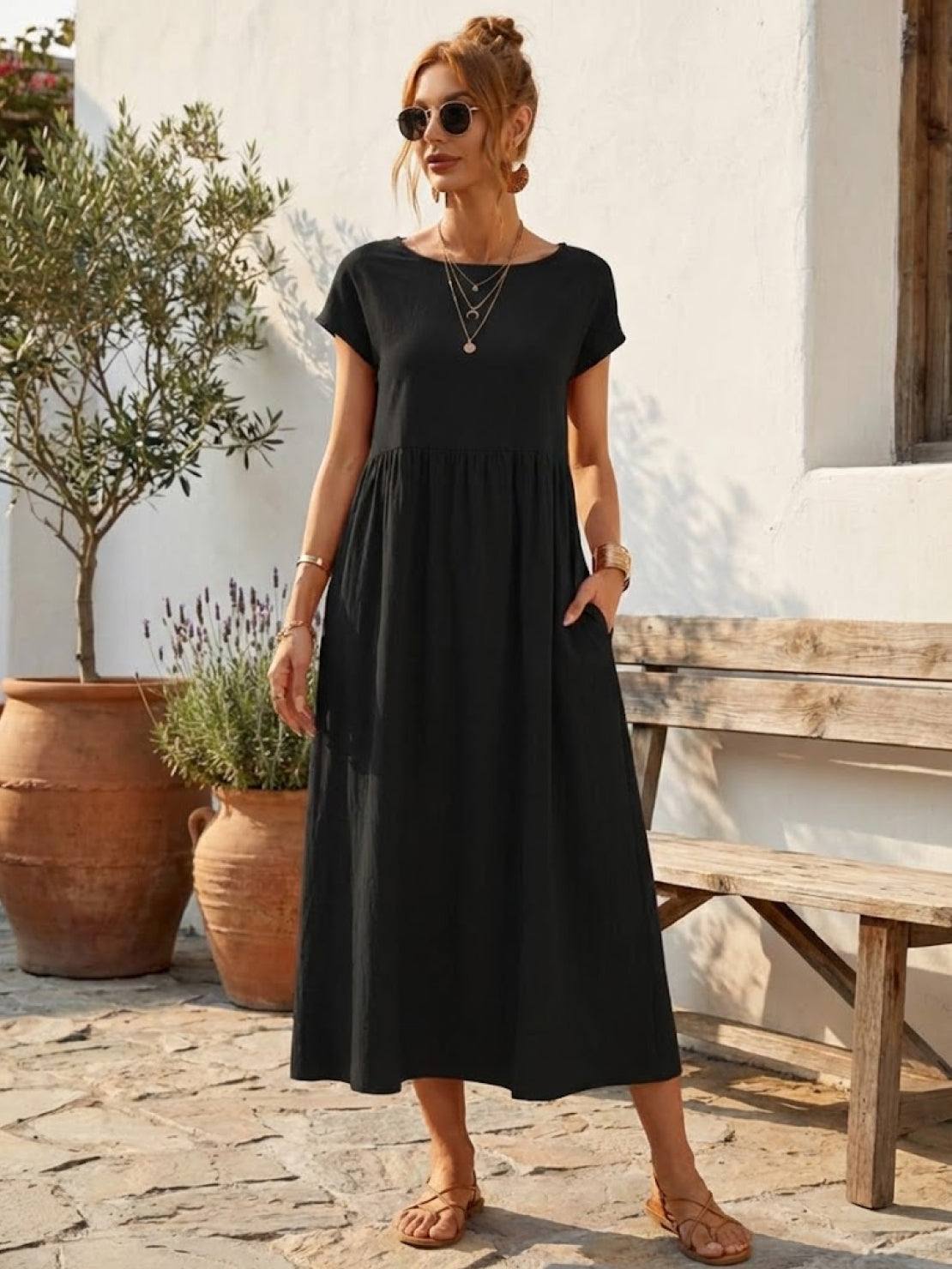 Vestido midi plisado con mangas tipo cap y volumen