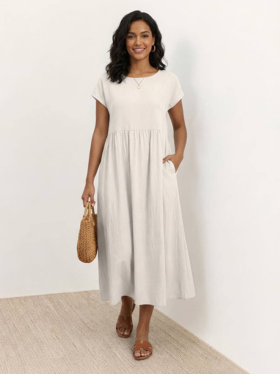Vestido midi plisado con mangas tipo cap y volumen