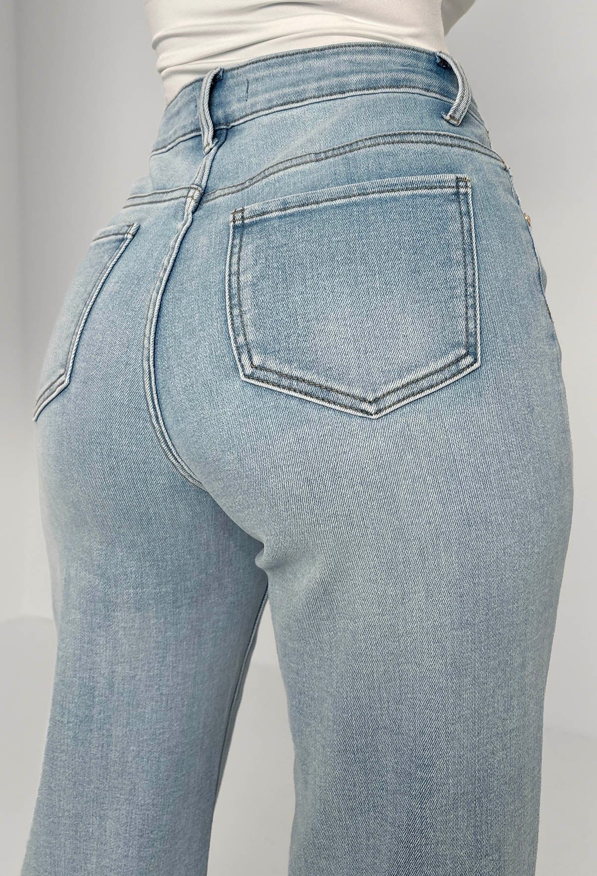 Escape In Denim vaqueros azul claro elásticos desgastados de pierna recta