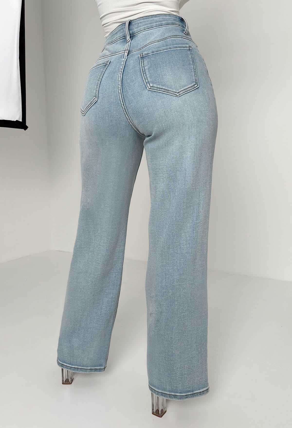 Escape In Denim vaqueros azul claro elásticos desgastados de pierna recta