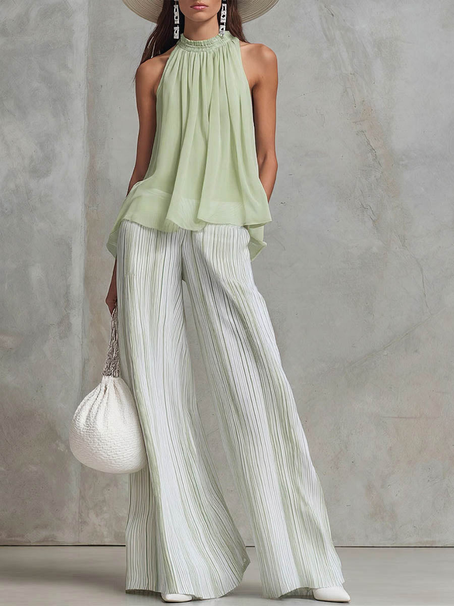 Clara | Conjunto elegante con top fluido y pantalón de rayas
