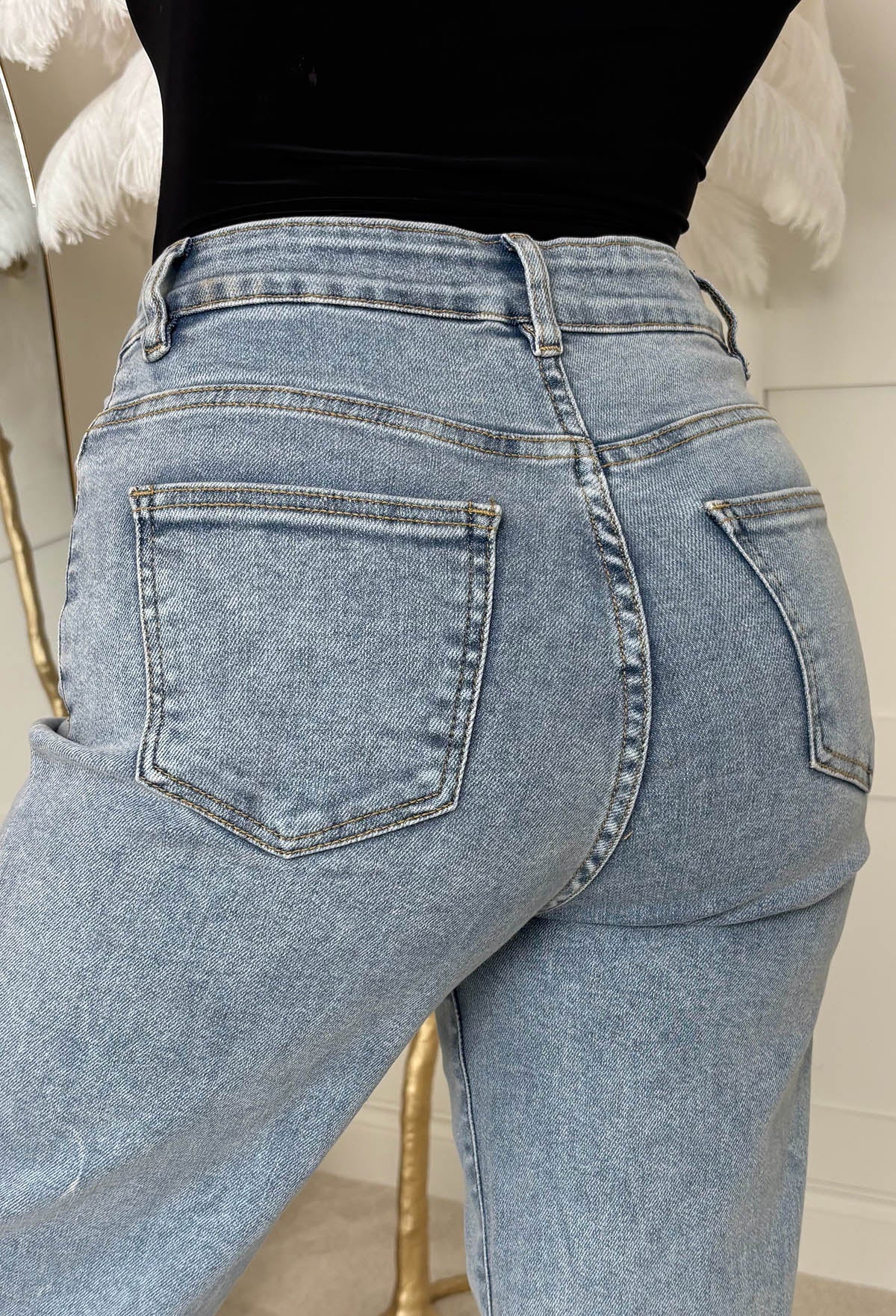 Rae Jeans de lavado medio, súper elásticos, acampanados de pierna ancha